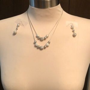 Necklace with matching earrings.